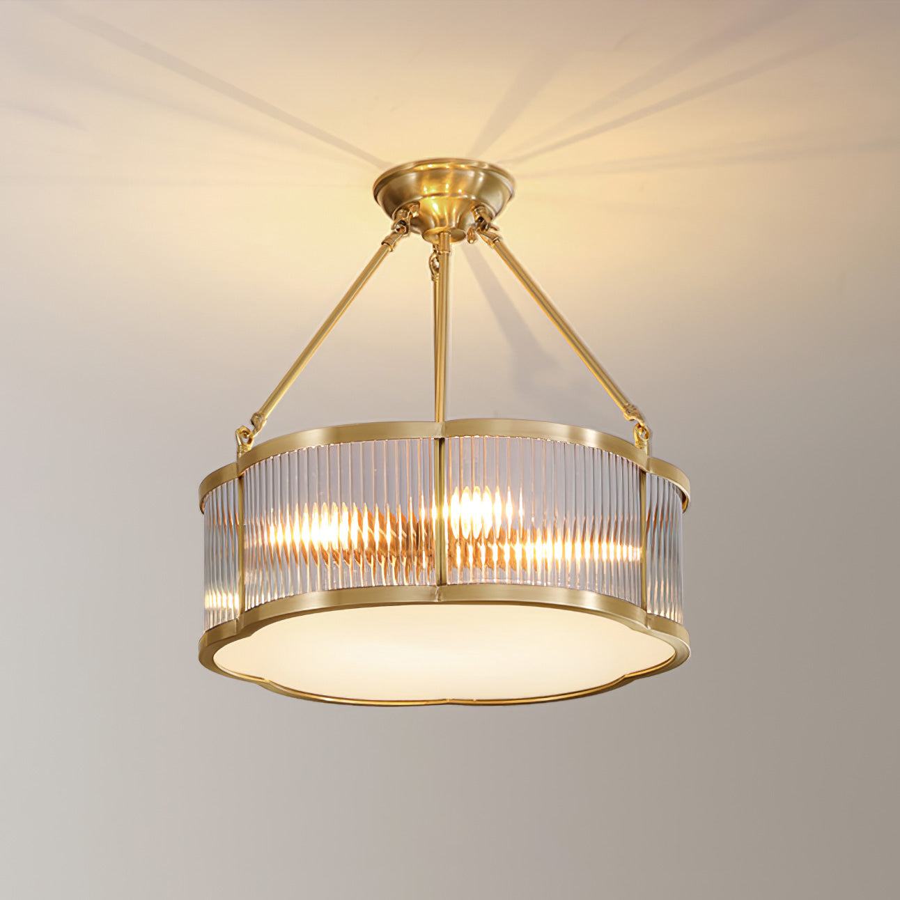 Elegant Quatrefoil Brass Chandelier with Frosted Glass Diffuser for Modern Interiors