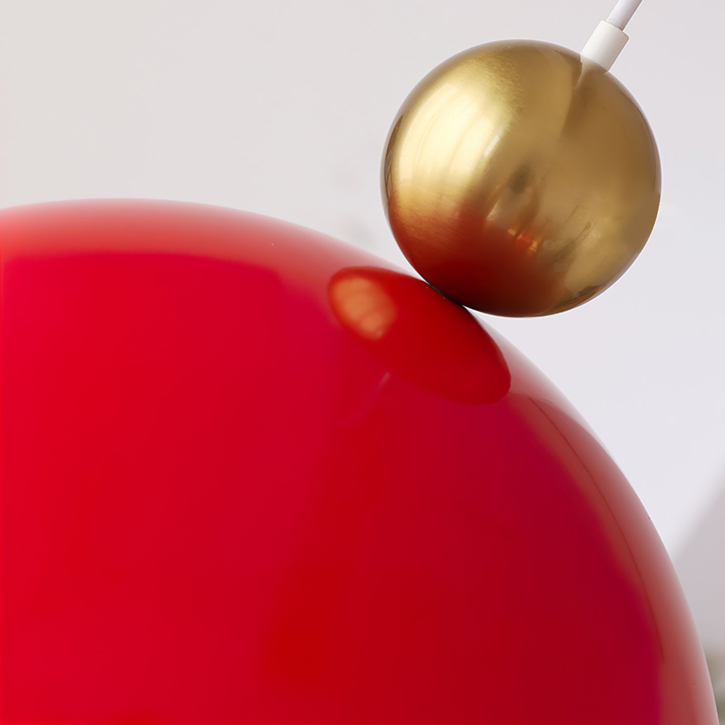 Posa Modern Minimalist Metal Pendant Lamp, Elegant Gold Finish, Colorful Orb Accent